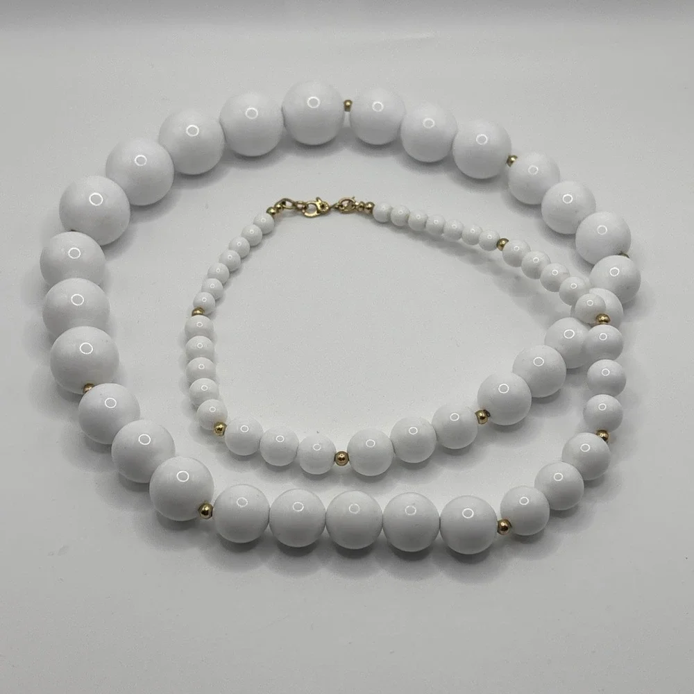 Long Vintage Monet White Graduated Bead Necklace Gold Tone Spacers 31